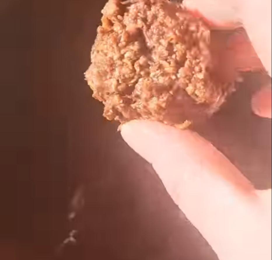 Step 1.1: Dunk the energy balls into the melted chocolate, then leave to set in the fridge for about half an hour