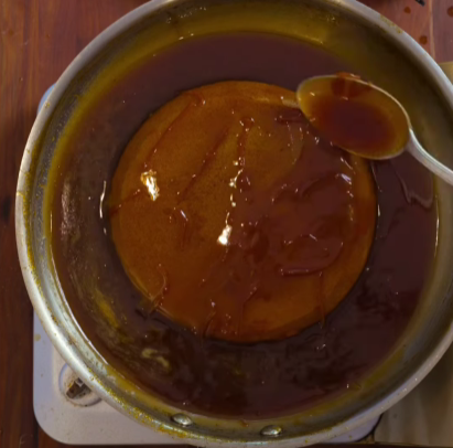 Step 4.1: Dip the pancakes into the sauce to coat them without breaking their texture