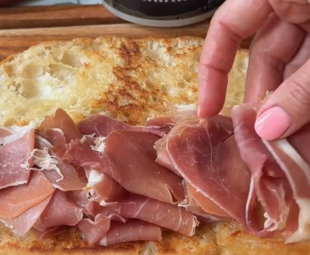 Step 1.1: Layer prosciutto and salami, then add tomato slices seasoned with flaky salt and pepper