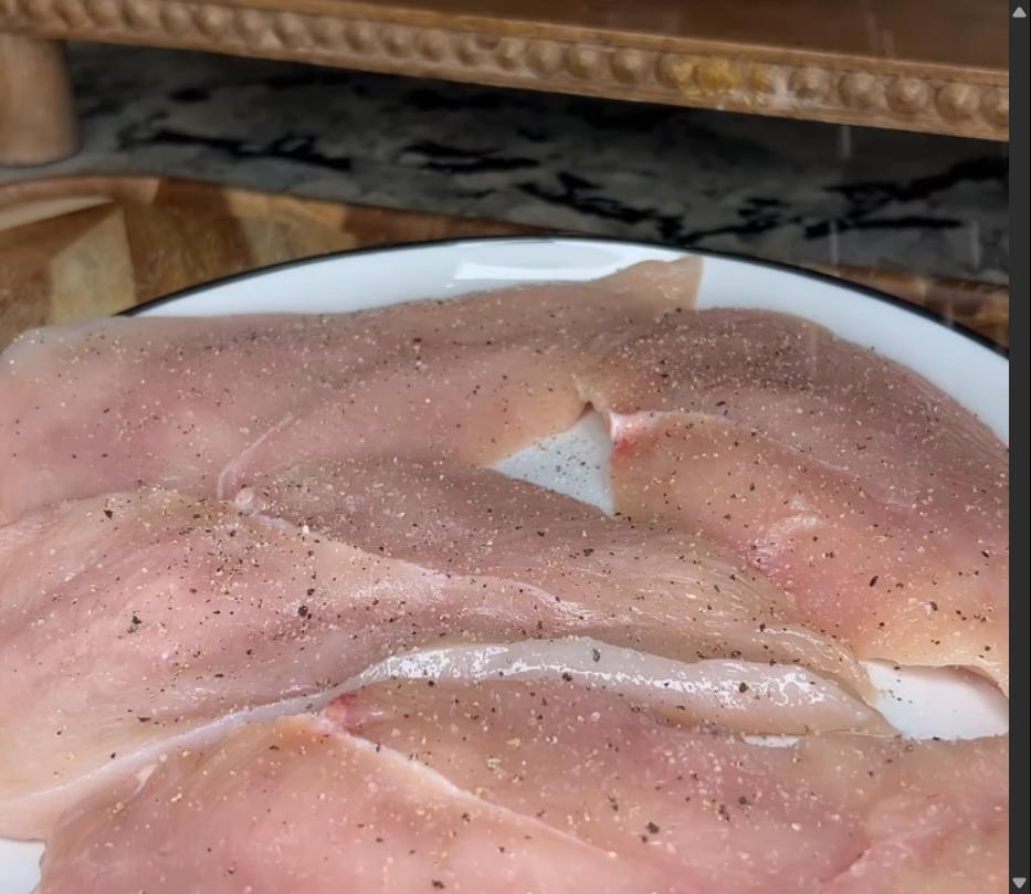 Step 1.1: Season both sides of chicken breasts with salt, pepper, garlic powder, paprika, and thyme