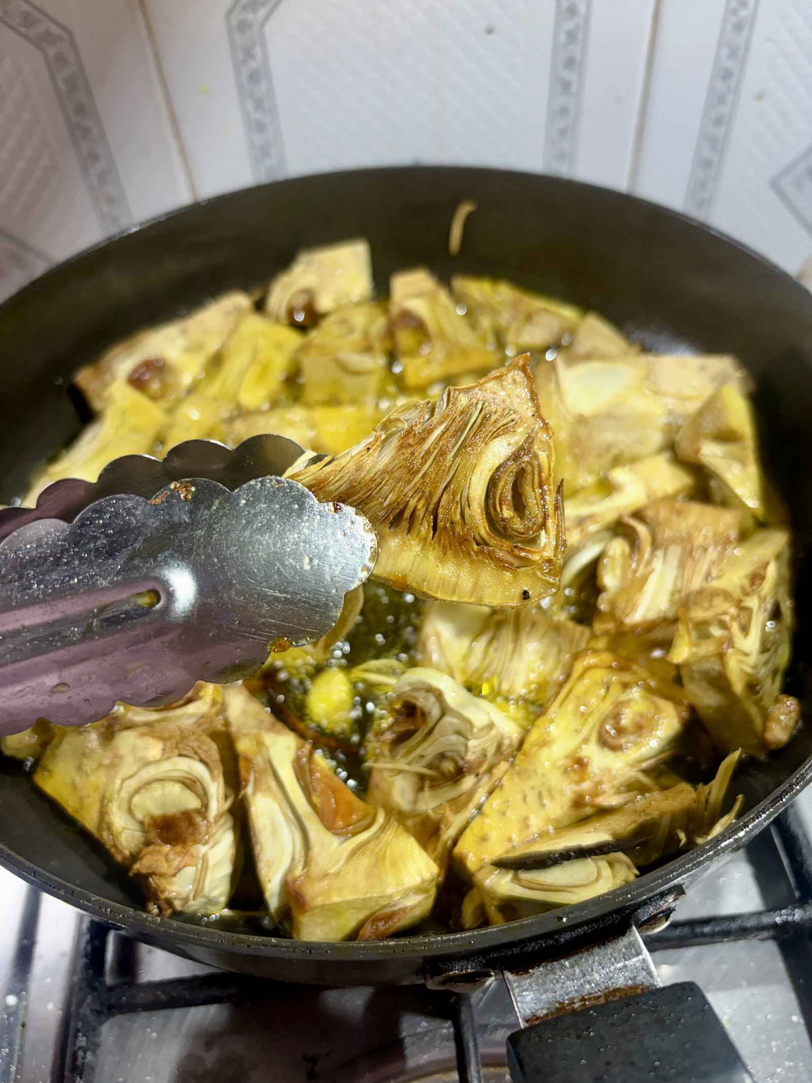Step 4.1: In the same oil, shallow-fry boiled jackfruit pieces until lightly golden
