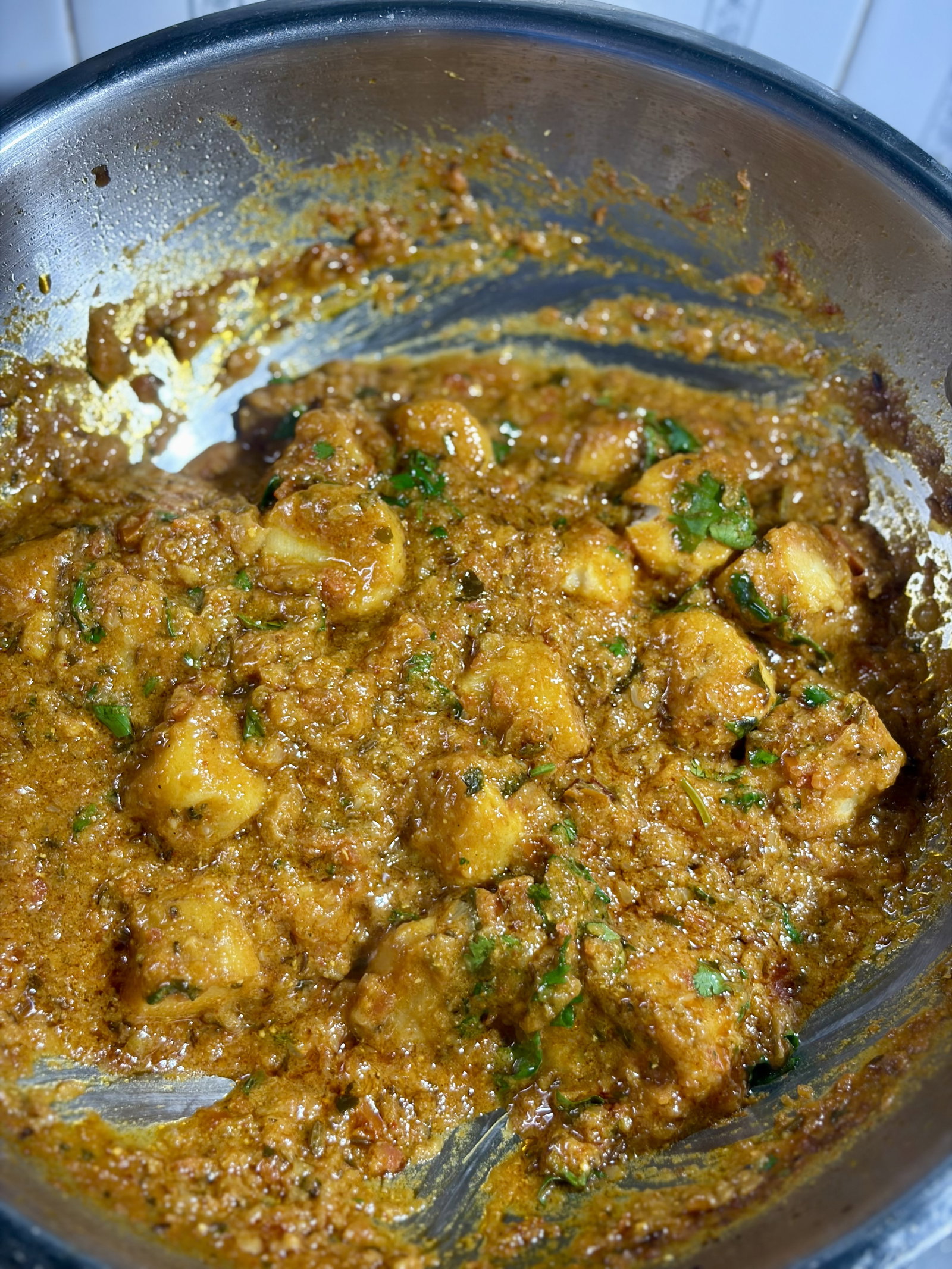 Step 6.1: Switch off the heat, garnish with fresh coriander, and let it sit for 10 minutes