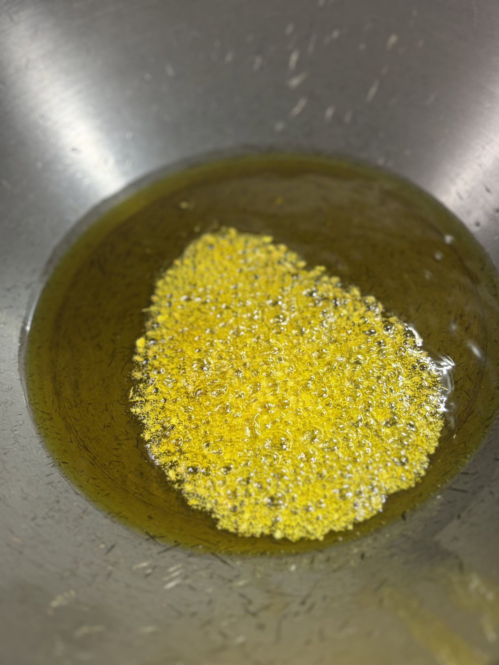 Step 2.1: Lower the heat and add the hing, fenugreek seeds, and carom seeds