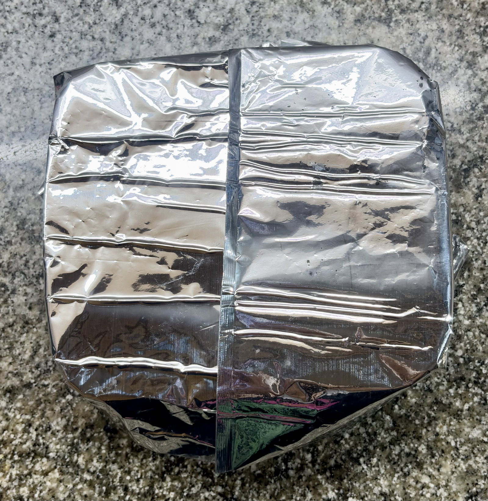 Step 2.1: Cover the container tightly with aluminum foil to prevent steam water from dripping into the dessert