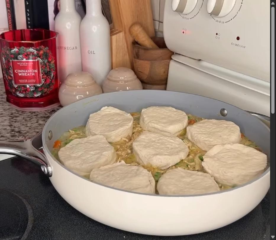 Step 1.1: Top the mixture with refrigerated biscuits