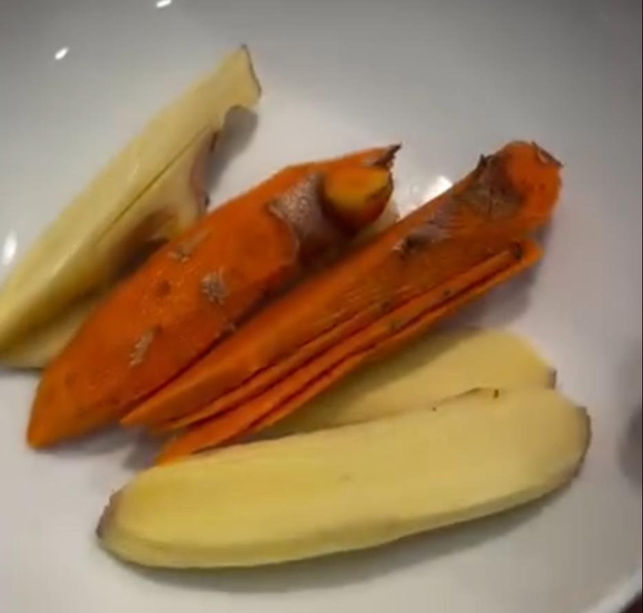 Step 1.1: Add diced potatoes, sliced turmeric, and sliced ginger to the pot