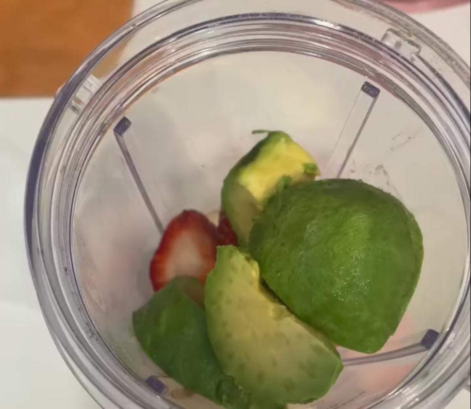 Step 1.1: Add chocolate protein powder, banana, strawberries, avocado, chia seeds, ground flax, peanut butter, ground cinnamon, and cacao nibs to a blender