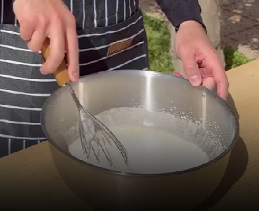 Step 1.1: Gently fold in the flour, baking powder, and salt by hand to keep the batter airy