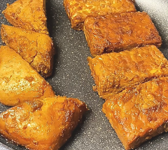 Step 2.1: Once the liquid is reduced, fry or toast the tempeh and tofu for added texture
