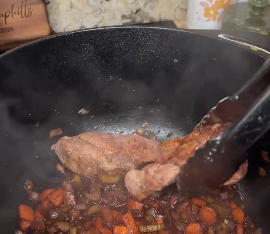 Step 1.1: Deglaze the pan with red wine, then add ribs back to the pan