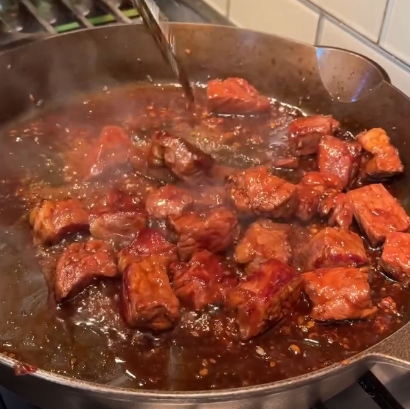 Step 1.1: Return steak to the pan and toss until fully coated and sticky