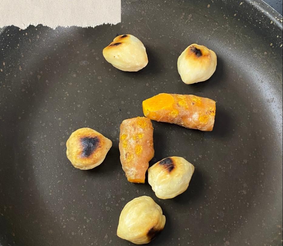 Step 2.1: Toast turmeric and candlenuts to enhance their flavor and color