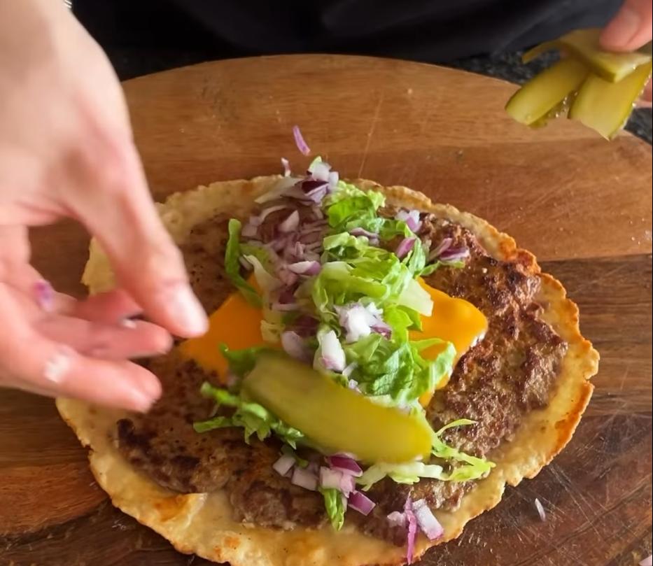 Step 1.1: Add the salad and sauce to the wrap