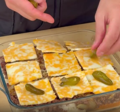 Step 3.1: Top with caramelized onions, cheese, and jalapeno slices