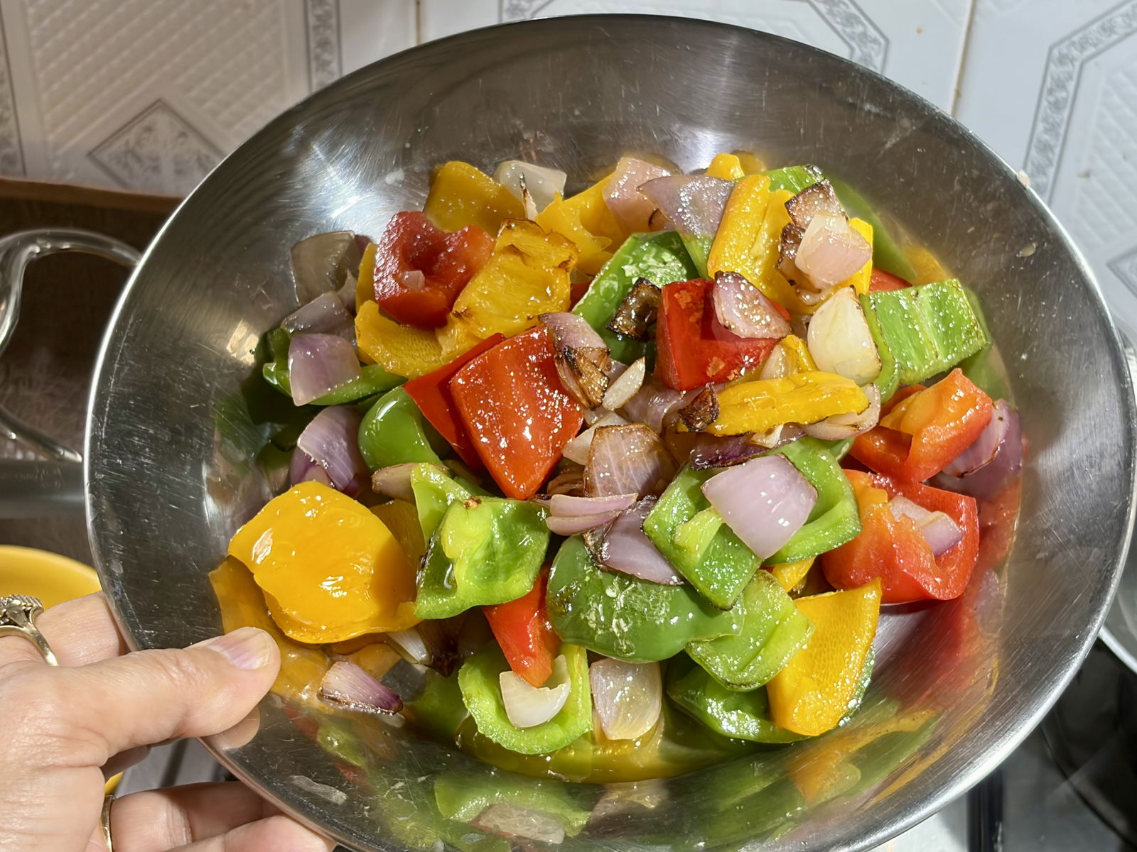 Step 3.2: Stir-fry the cubed onions and bell peppers for 1–2 minutes until slightly softened but still crunchy