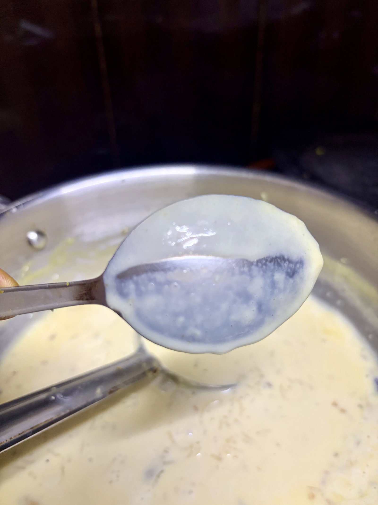 Step 5.2: Once the rice is soft and the milk has reduced, add the sugar, salt, and toasted almonds