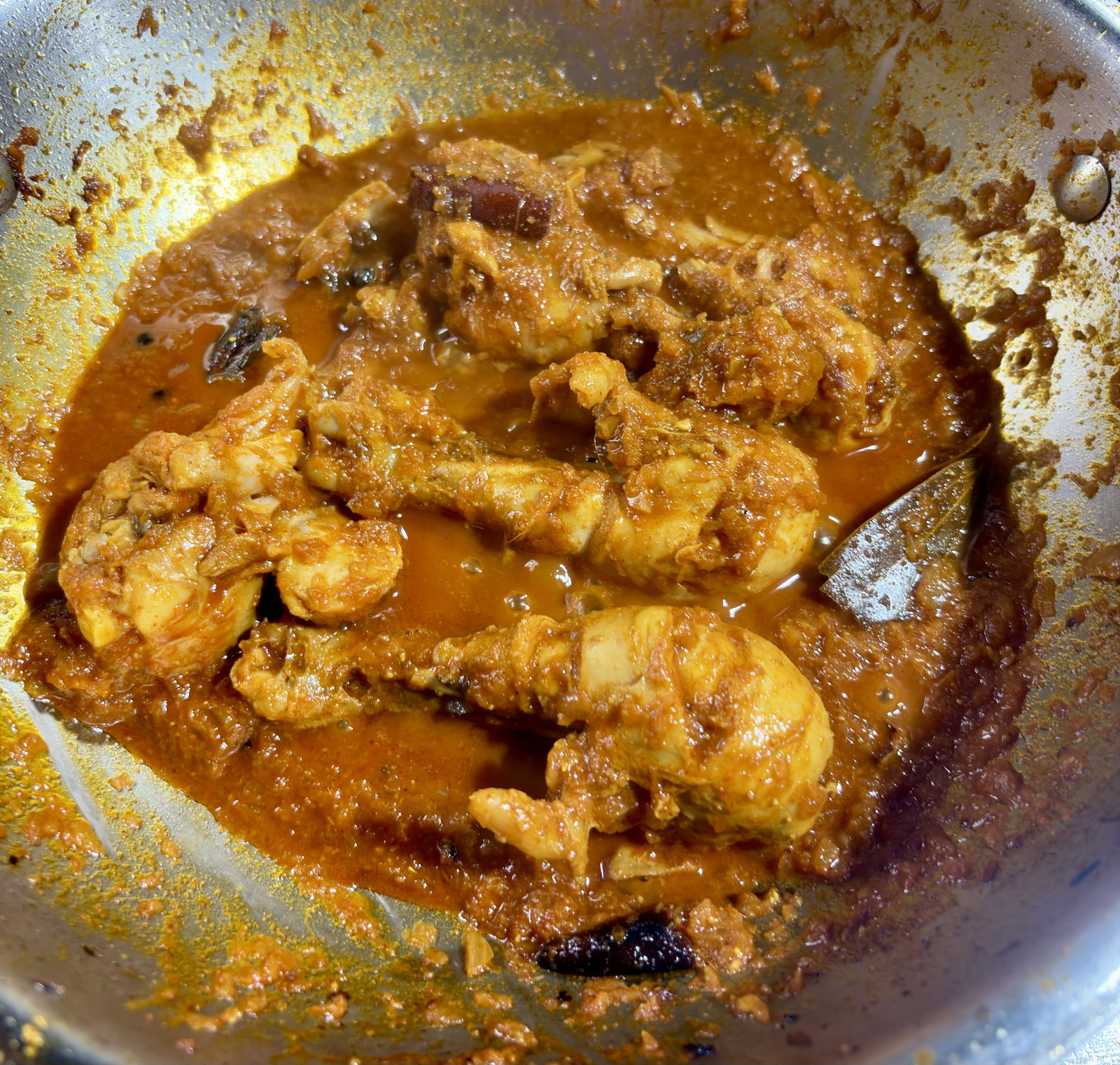 Step 3.1: Pour in 1/2 cup of hot water, stir, and cover the pan with a lid
