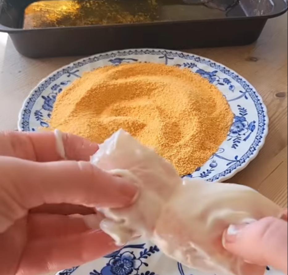 Step 1.1: Mix garlic granules and paprika with golden breadcrumbs, then dip the fish into the mixture to coat