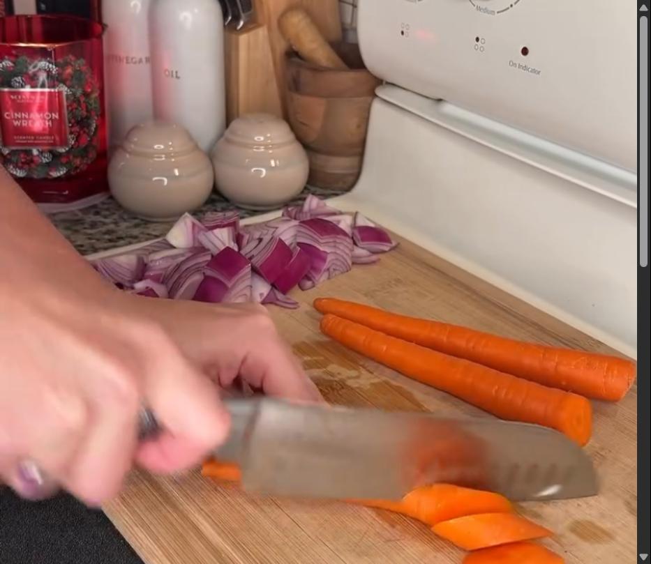 Step 2.1: Chop red onion, carrots, brussel sprouts, and fingerling potatoes into bite-sized pieces
