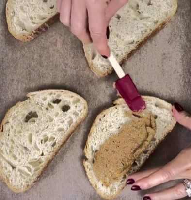 Step 3.1: On one side of the sourdough bread, spread mustard and add cheese