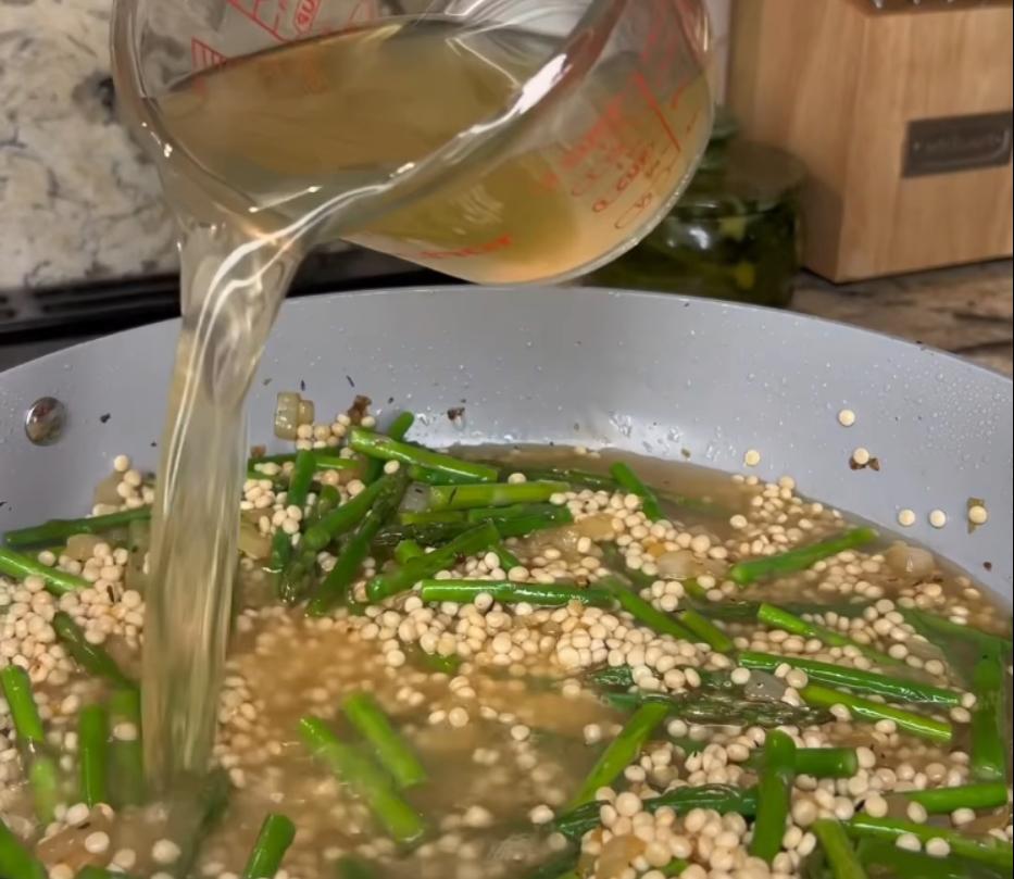 Step 2.1: Mix in chicken broth and bring to a boil