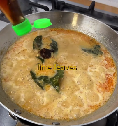 Step 2.1: Add the remaining coconut milk and kafir lime leaves, then cook for 10 minutes