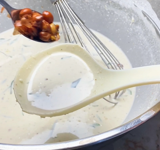 Step 3.1: Sprinkle peanuts into the pan before pouring the batter