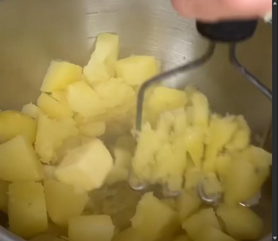 Step 1.1: Add a few tablespoons of butter and hand mash the potatoes