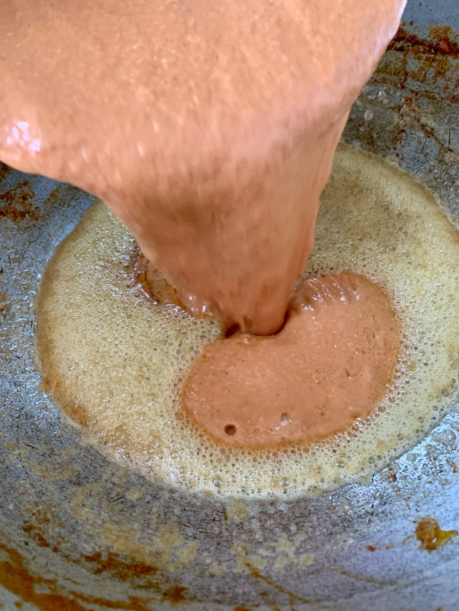Step 4.1: Pour in the strained gravy and the reserved marinade