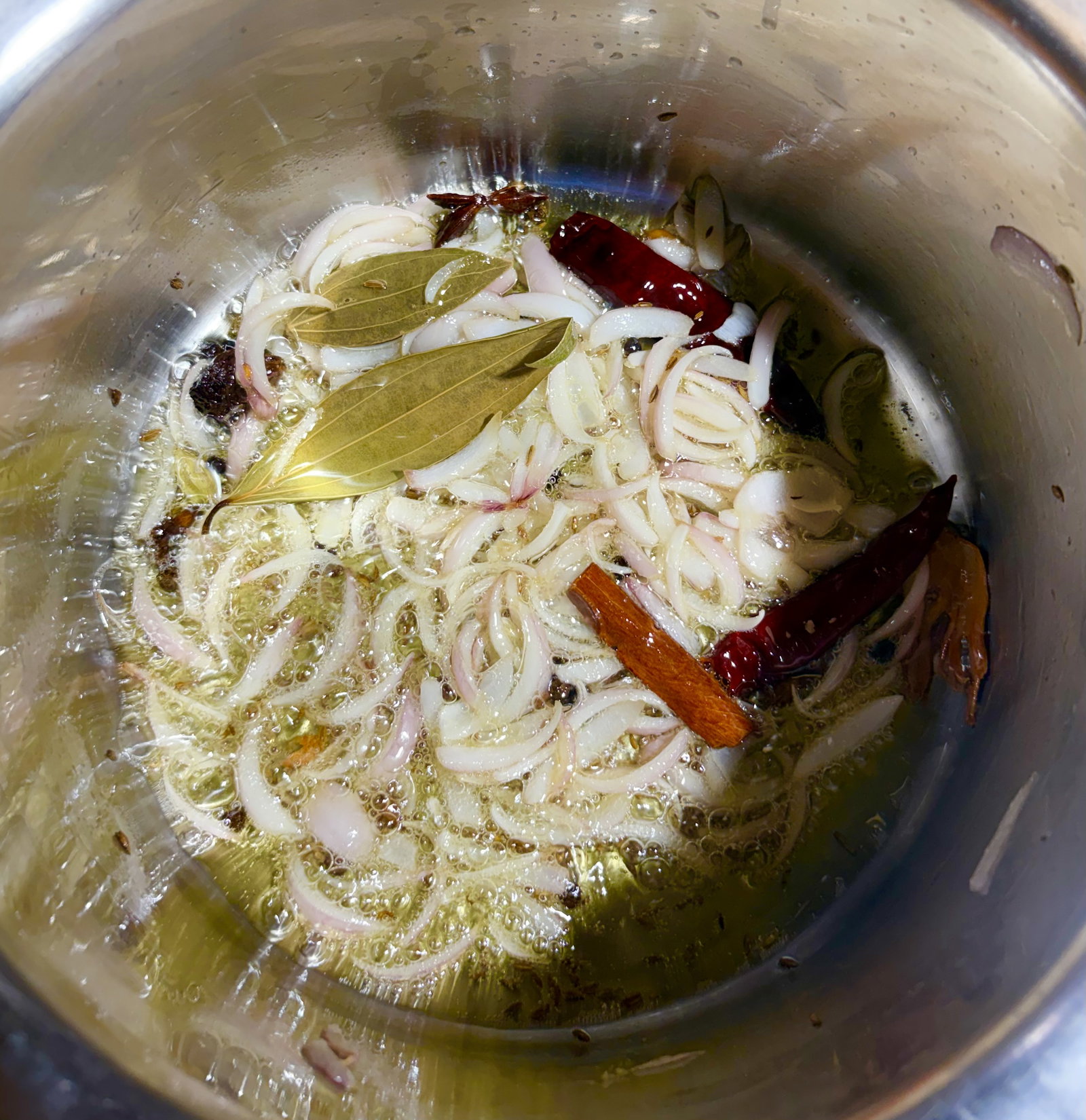 Step 1.1: Add the sliced onions and fry until soft and translucent