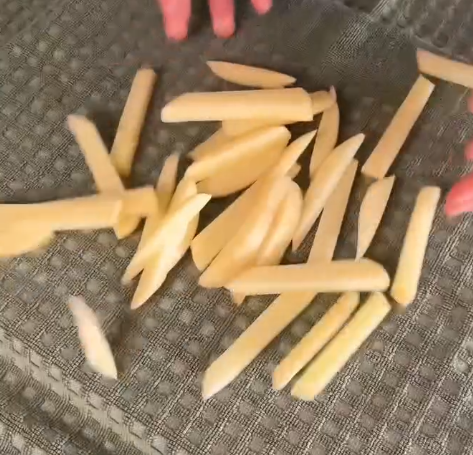 Step 1.1: Cut potatoes into fries, leaving the skin on