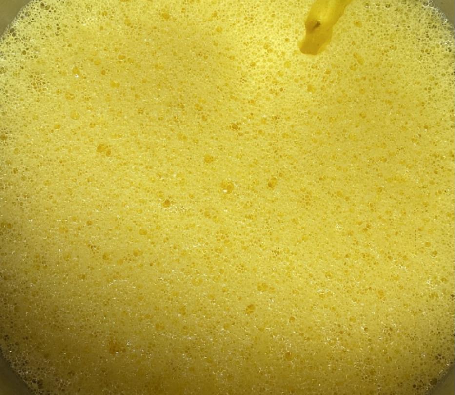 Step 1.1: Once the batter is bubbly and foamy, add melted butter and mix in