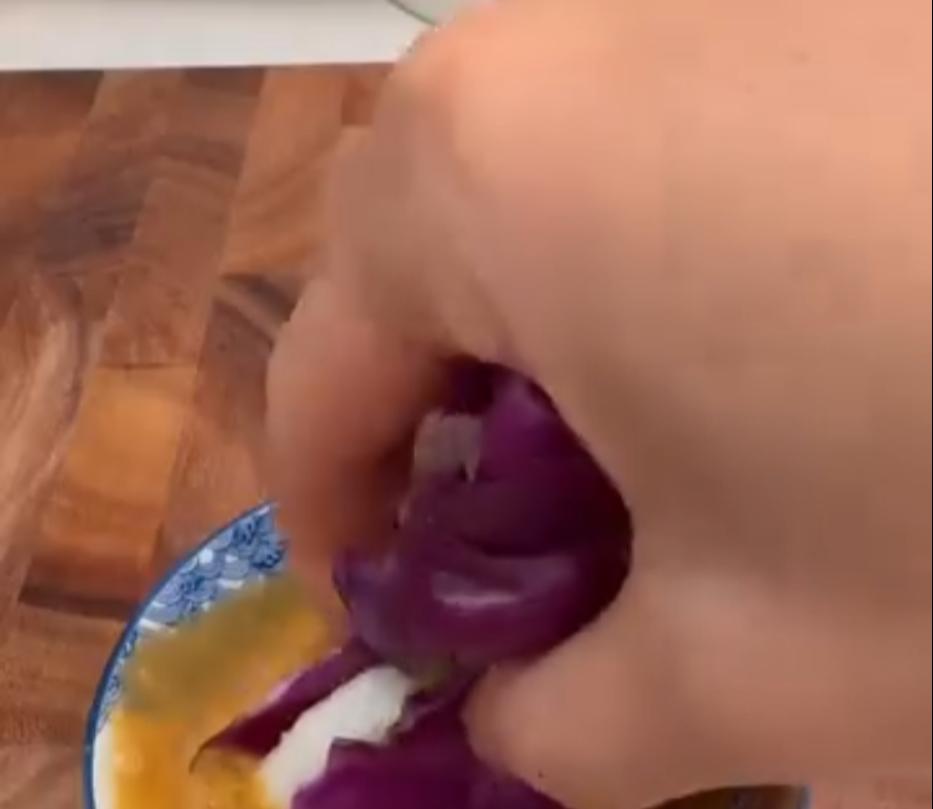 Step 3.1: Roll the cabbage leaf tightly around the fillings to form a spring roll