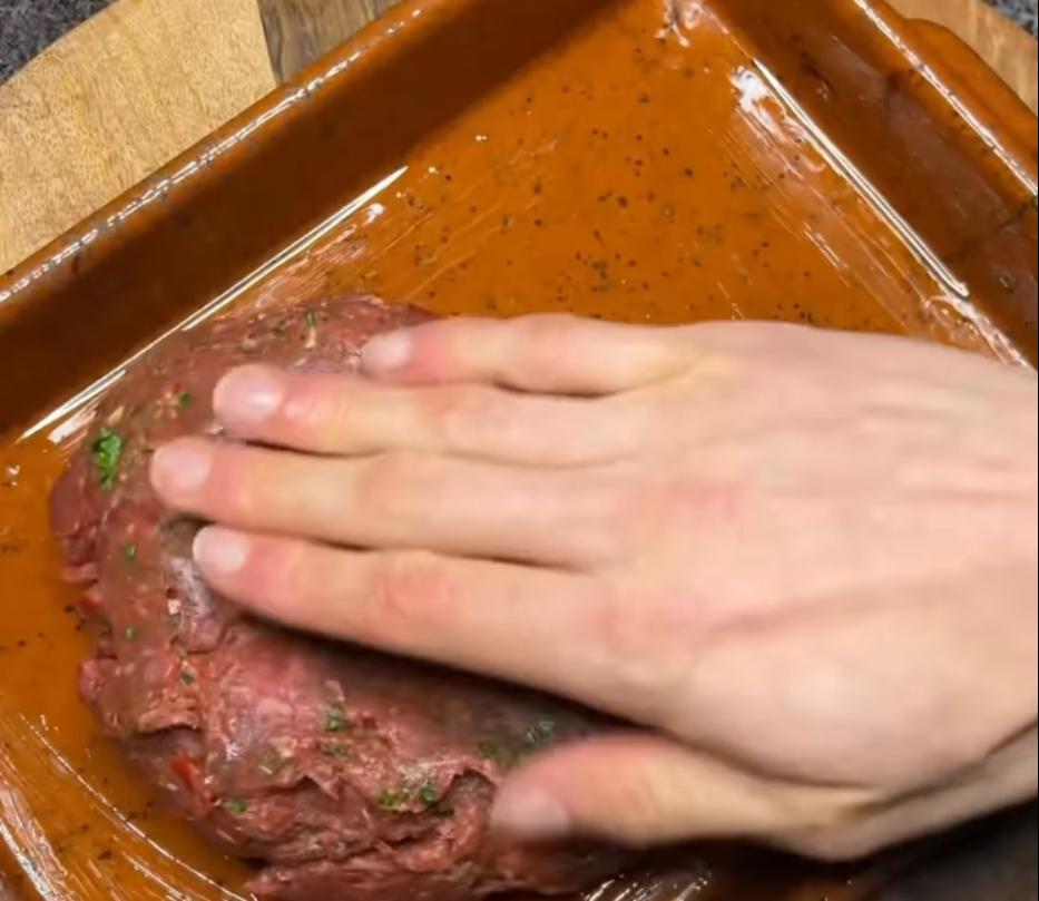 Step 1.1: Drizzle olive oil on a sheet pan, spread beef mixture in a flat even layer