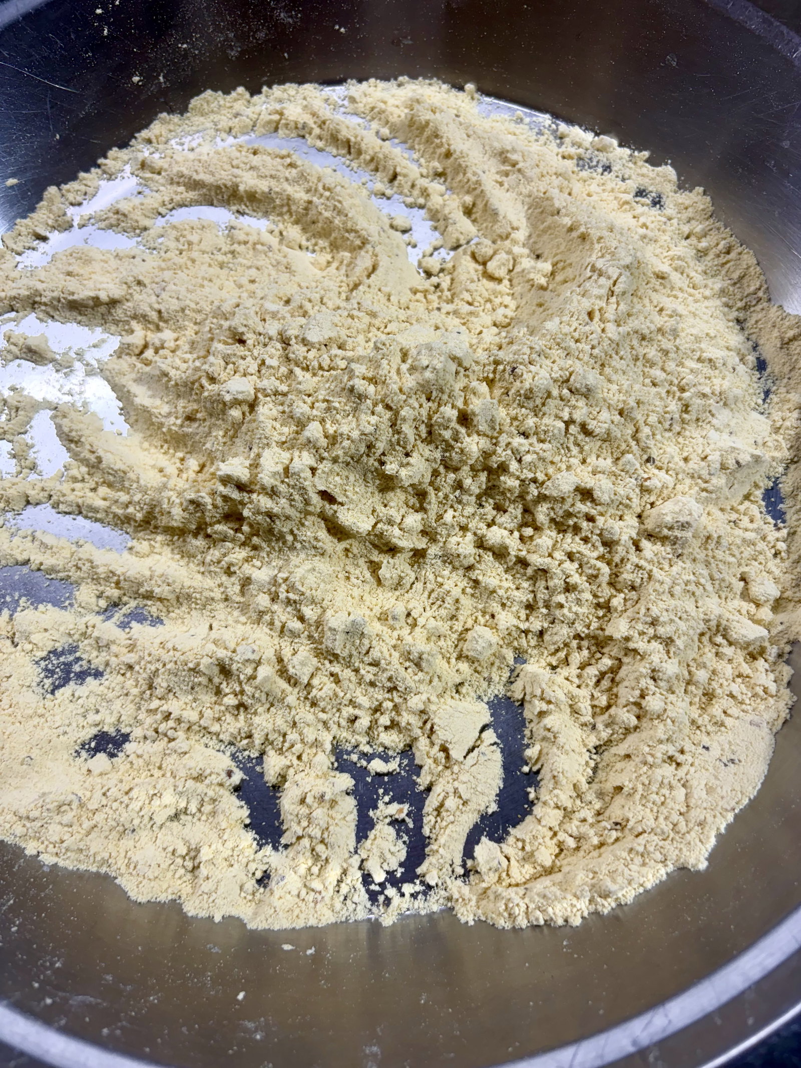 Step 2.2: In a large bowl, mix the besan, salt, ajwain, turmeric, chilli flakes, and baking soda