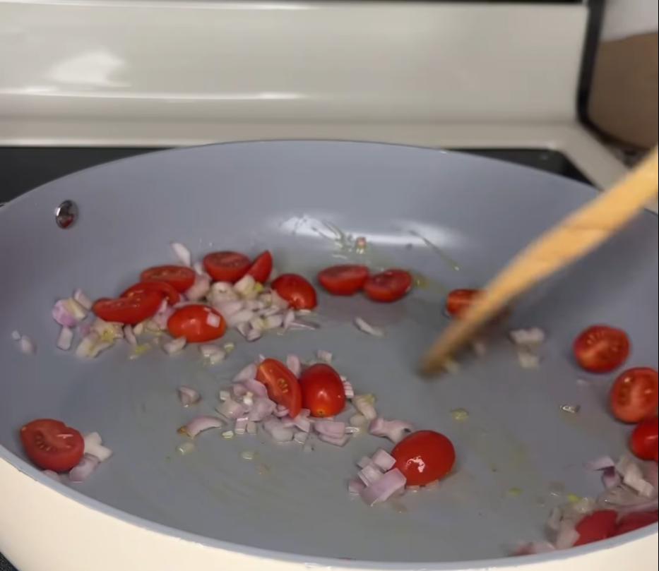 Step 2.1: Heat olive oil in another pan and sauté diced shallot and sliced grape tomatoes