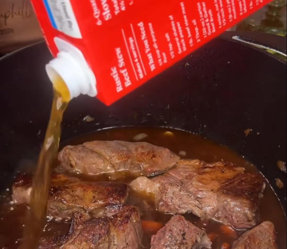 Step 1.1: Pour in beef broth until ribs are fully covered, then toss in fresh herbs