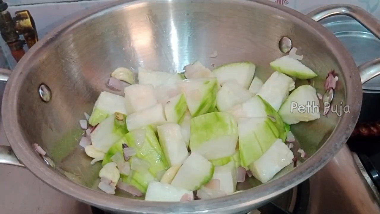 Step 1.1: Add the white pumpkin pieces and sauté with a pinch of salt until lightly softened