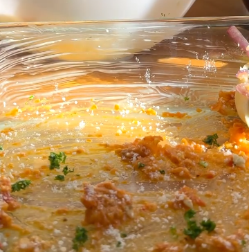 Step 1.1: Spoon a layer of Organic Roasted Red Pepper and Almond Pesto Sauce onto the bottom of the dish