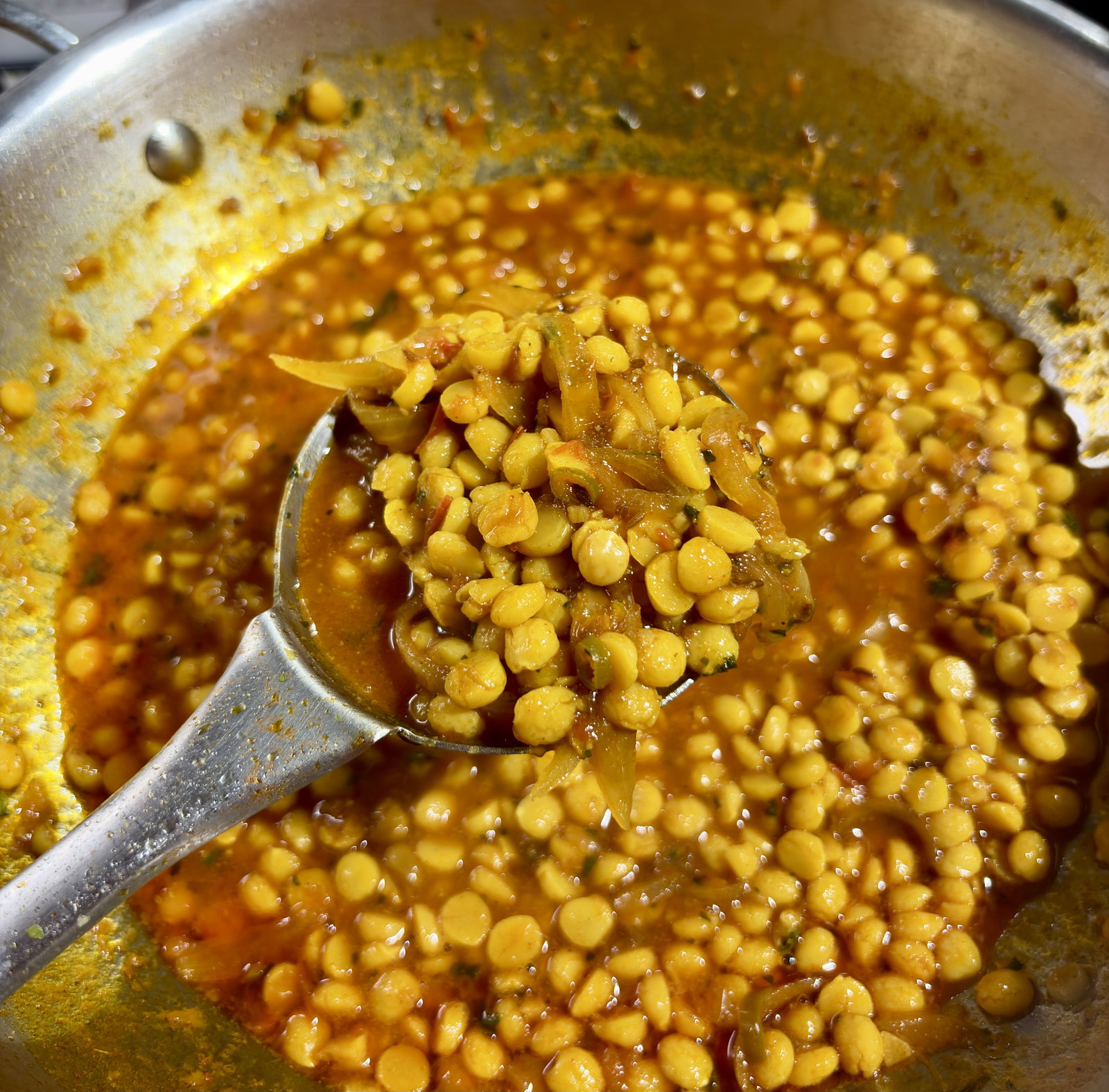 Step 4.1: Simmer covered on low-to-medium heat for 40–50 minutes, stirring occasionally