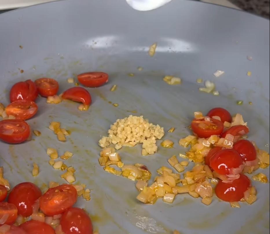 Step 2.1: Add garlic and tomato paste, stir, and cook for 1 minute