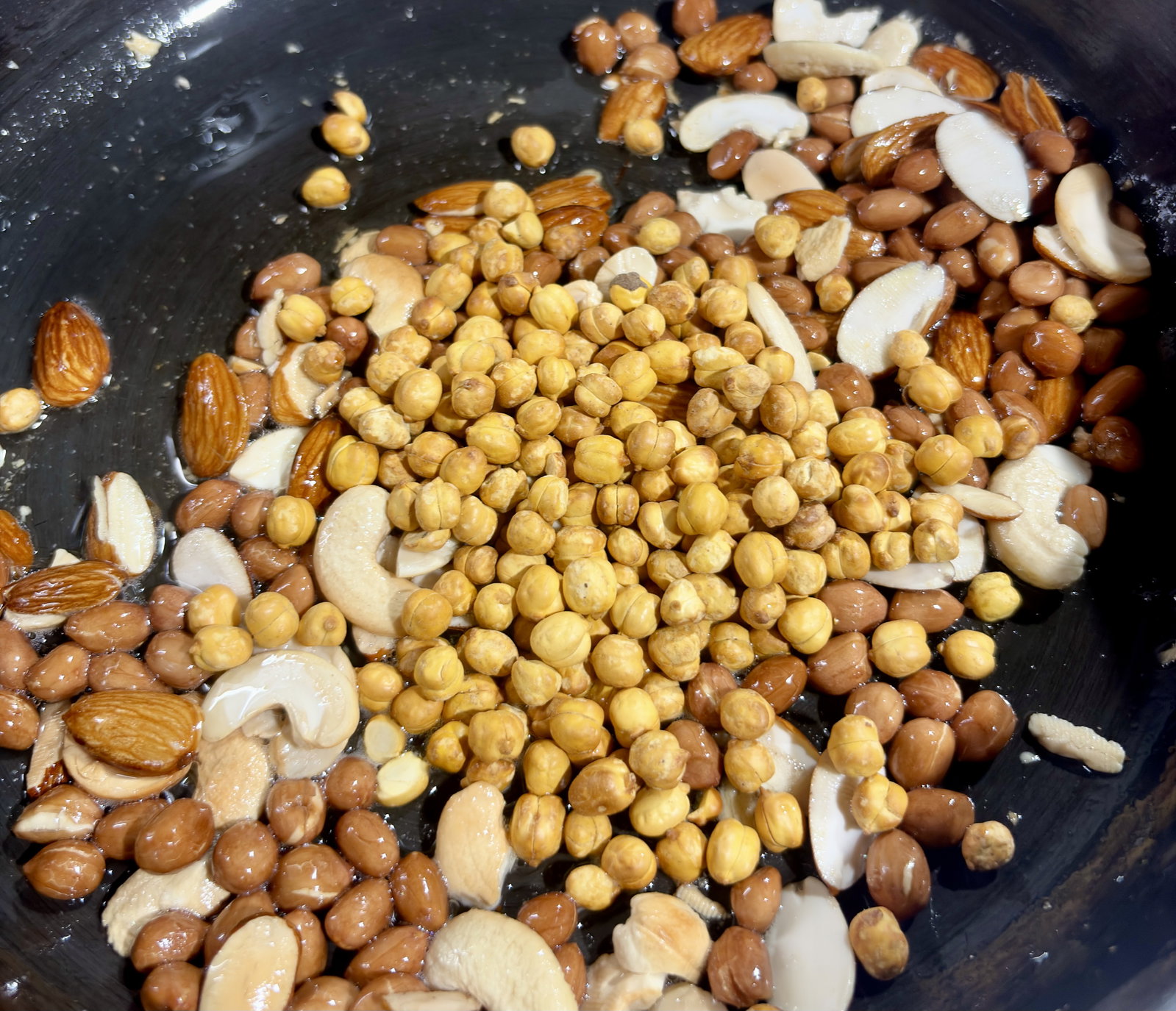Step 2.1: Stir in the roasted chana and fry for a minute