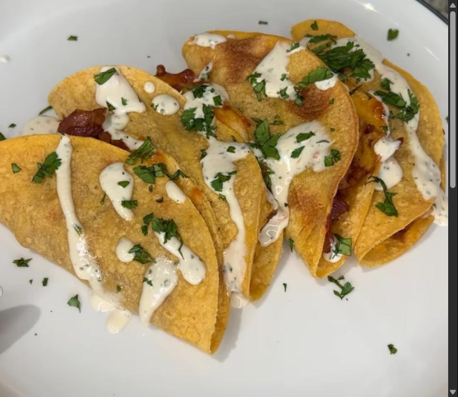 Step 1.1: Top baked tacos with ranch dressing and fresh cilantro before serving