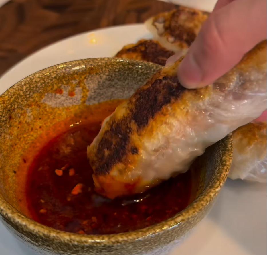 Step 4.1: Serve the spring rolls with dipping sauce made of chili oil and white vinegar