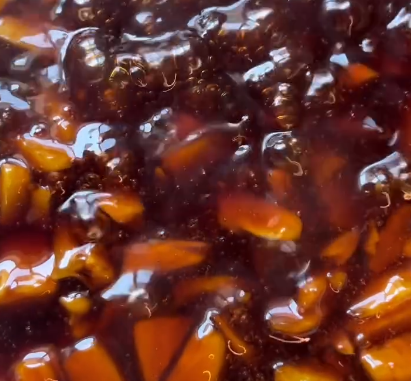 Step 2.2: Pour the cornstarch mixture into the boiling sauce and stir until thickened