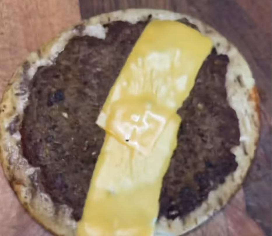 Step 2.1: Add a slice of burger cheese and put a lid on until it melts