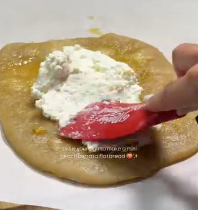 Step 1.1: Tear the burrata and spread it evenly over the flatbreads