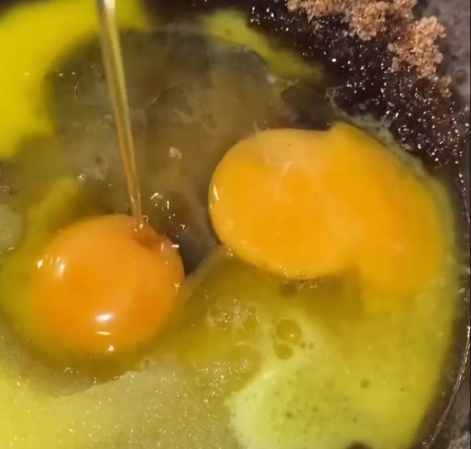 Step 1.1: Whisk in whole egg, egg yolk, and vanilla extract until smooth