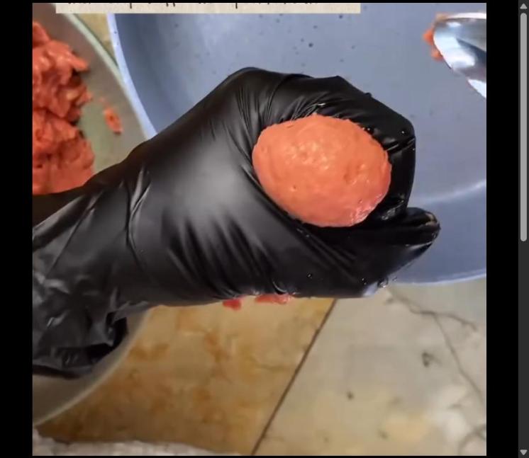 Step 1.1: Squeeze the meatball mixture through your fingers to form balls, then scoop them off with a spoon