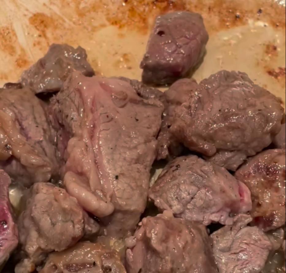Step 2.1: Add the stewed beef to the pot and cook for 5-7 minutes until browned on all sides